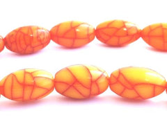 50 Orchre Amber 7mm x 5mm Oval Beads