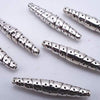 15 Long Shiny Astek Tibetan Icicle Barrel Spacers - Dramatic!