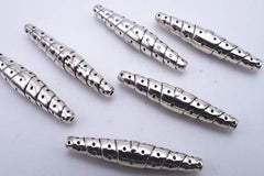 15 Long Shiny Astek Tibetan Icicle Barrel Spacers - Dramatic!