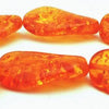 Unusual Twisted Amber Oval Beads