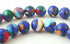 Deep Blue & Red Picasso Calsilica Beads - 6mm