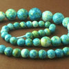 Long Graduated 14mm to 6mm Sky-Blue Rainflower Vieweing Stone Bead String