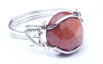 Beautiful Faceted Goldstone Ring - transmitter stone