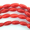 65 Red Coral Rice Beads - 6mm x 3mm