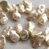 70 Large Gleaming Silvery-White Keshi Pearls